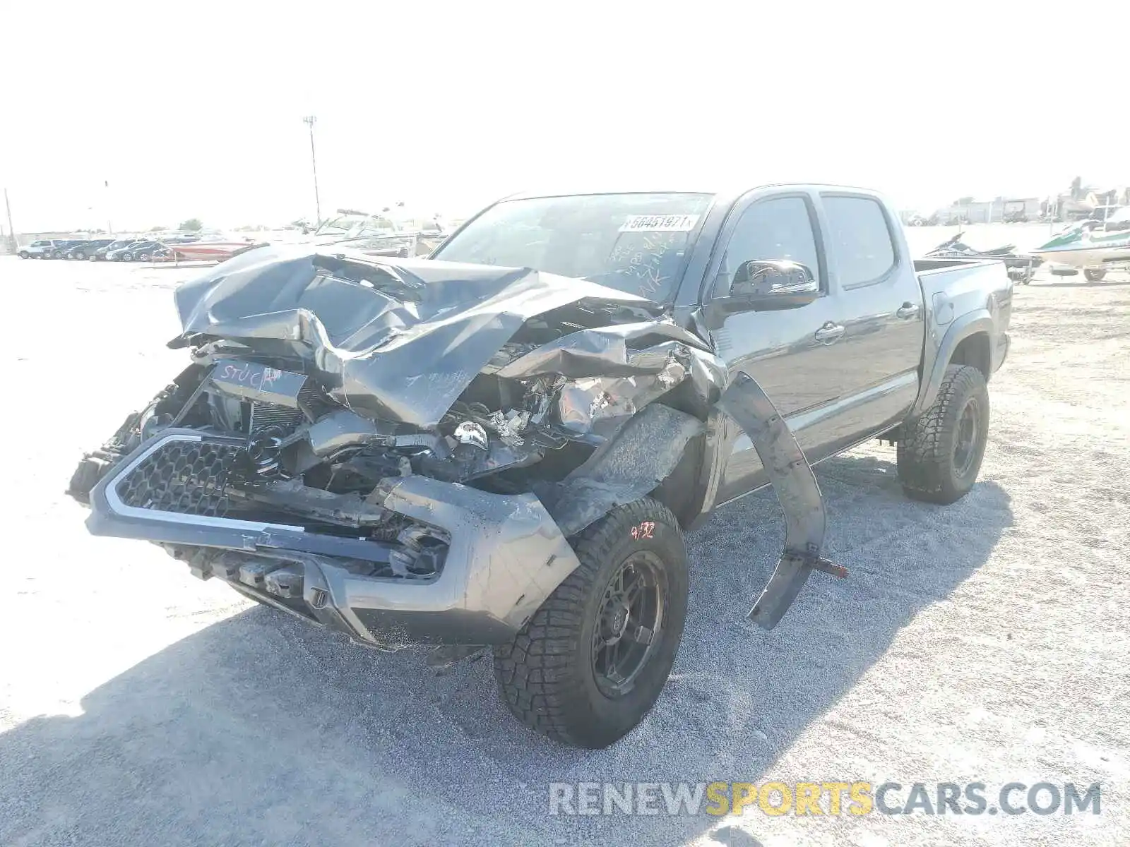 2 Photograph of a damaged car 5TFAZ5CN2KX075484 TOYOTA TACOMA 2019