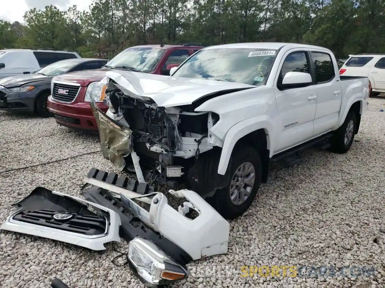 2 Photograph of a damaged car 5TFAZ5CN2KX076490 TOYOTA TACOMA 2019