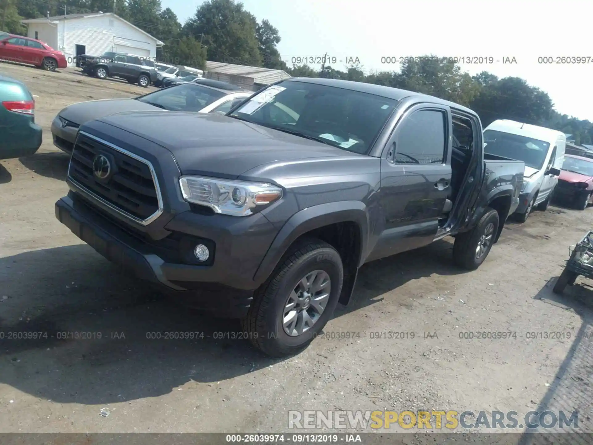 2 Photograph of a damaged car 5TFAZ5CN2KX077705 TOYOTA TACOMA 2019