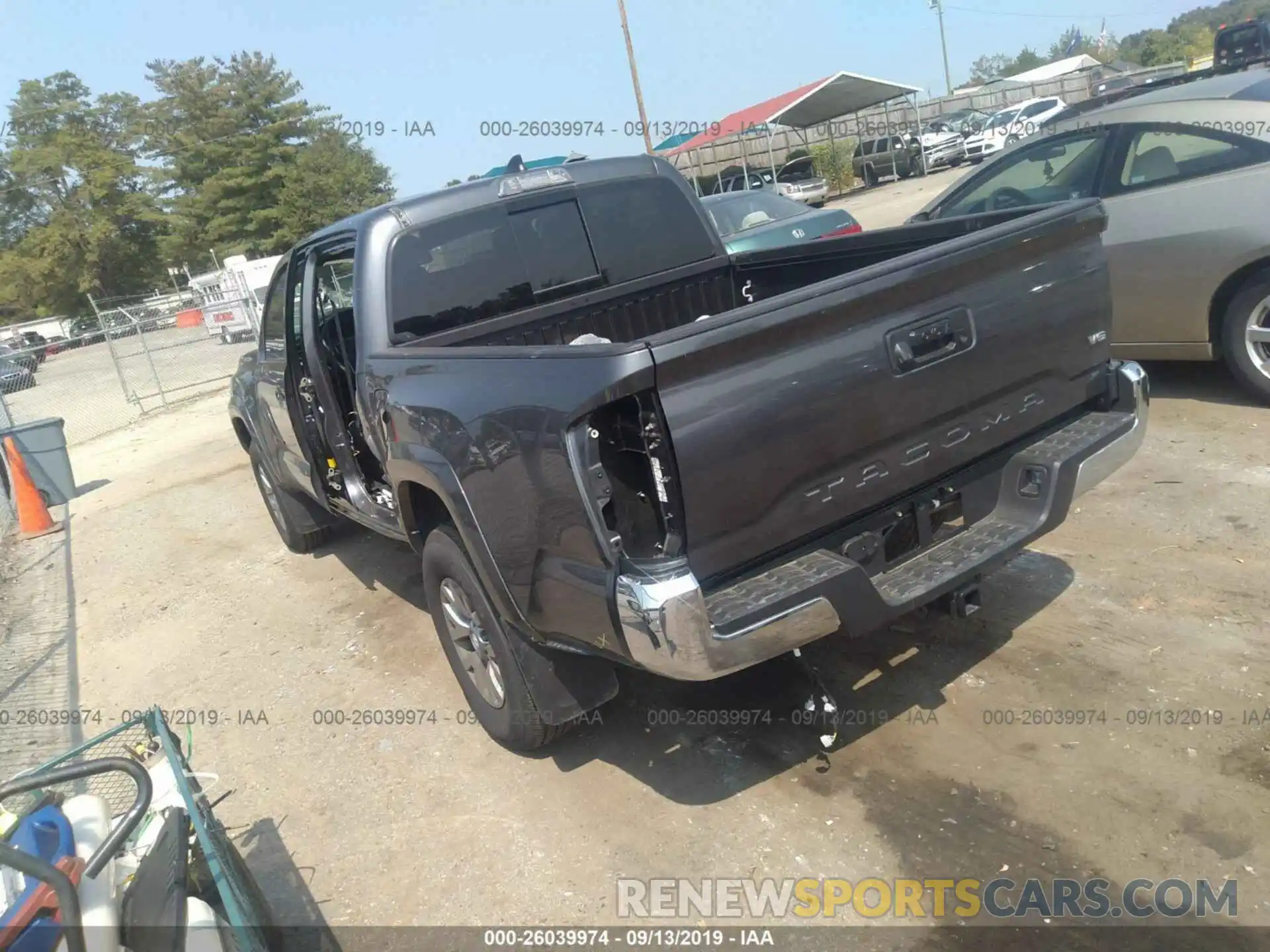 3 Photograph of a damaged car 5TFAZ5CN2KX077705 TOYOTA TACOMA 2019