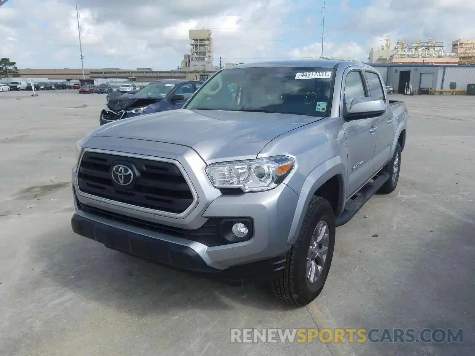 2 Photograph of a damaged car 5TFAZ5CN2KX081723 TOYOTA TACOMA 2019