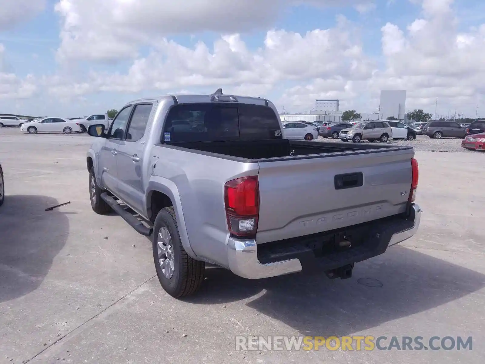 3 Photograph of a damaged car 5TFAZ5CN2KX081723 TOYOTA TACOMA 2019