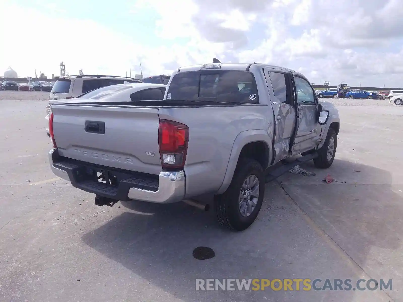 4 Photograph of a damaged car 5TFAZ5CN2KX081723 TOYOTA TACOMA 2019