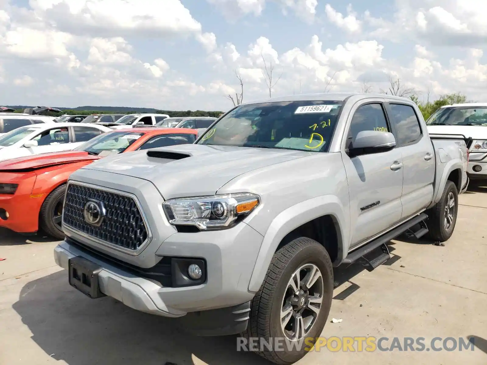 2 Photograph of a damaged car 5TFAZ5CN2KX082550 TOYOTA TACOMA 2019