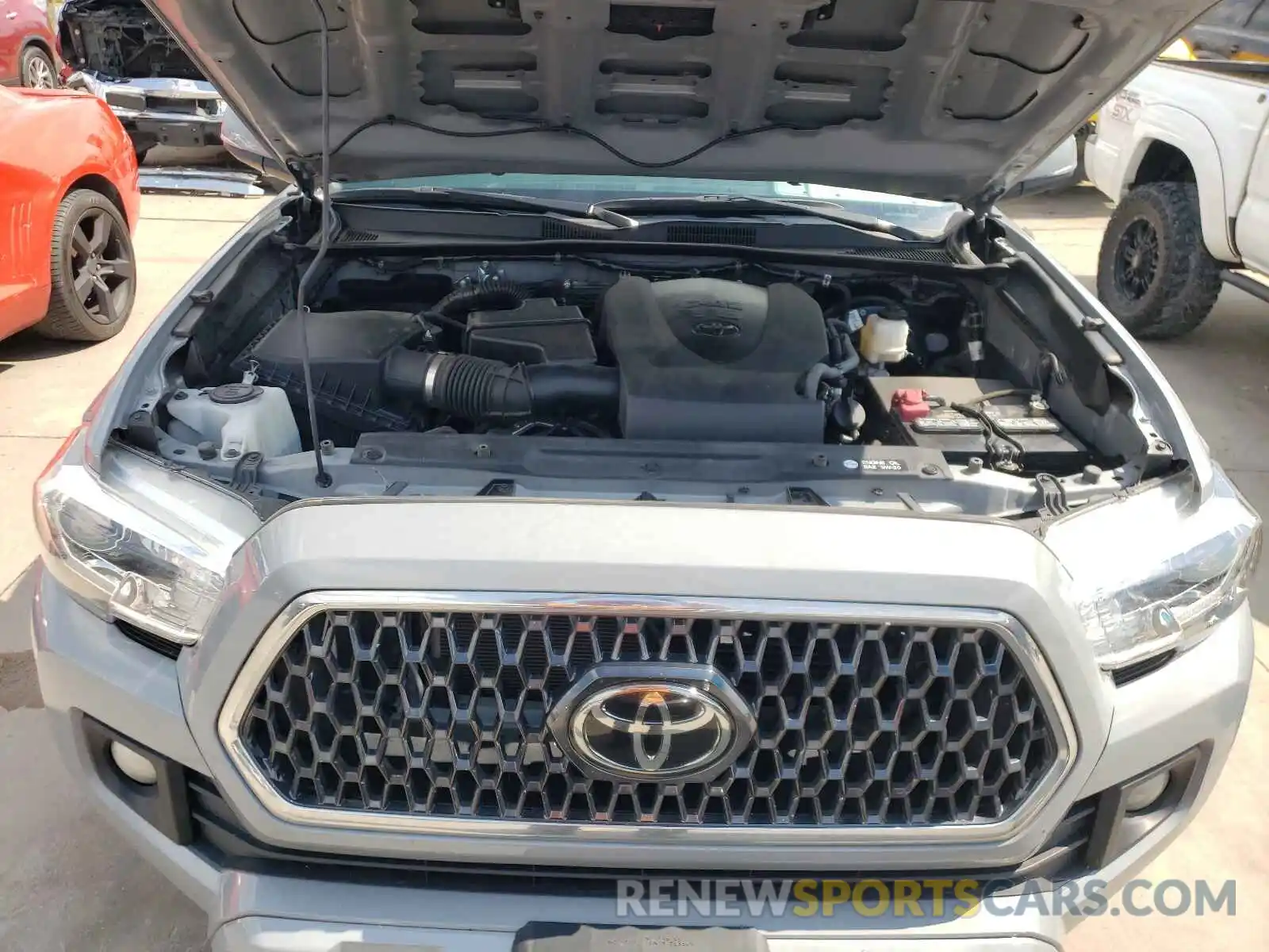 7 Photograph of a damaged car 5TFAZ5CN2KX082550 TOYOTA TACOMA 2019