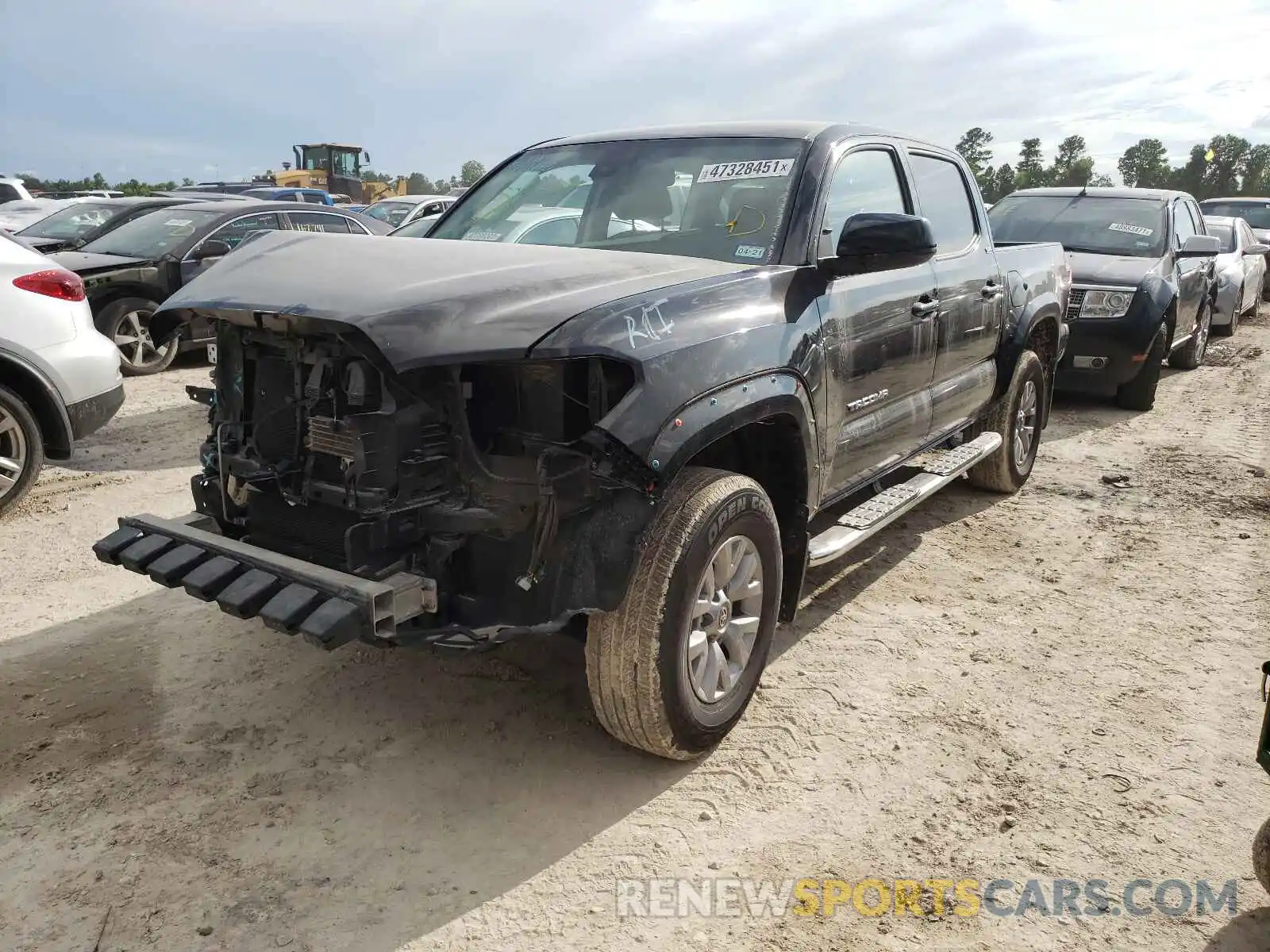 2 Photograph of a damaged car 5TFAZ5CN2KX083097 TOYOTA TACOMA 2019