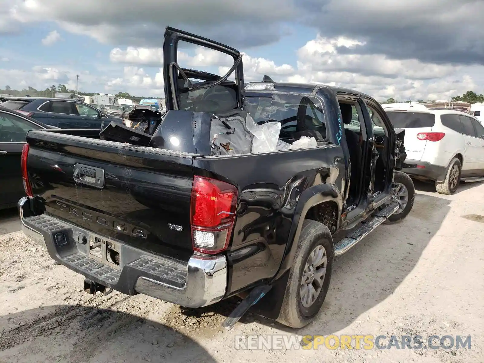 4 Photograph of a damaged car 5TFAZ5CN2KX083097 TOYOTA TACOMA 2019