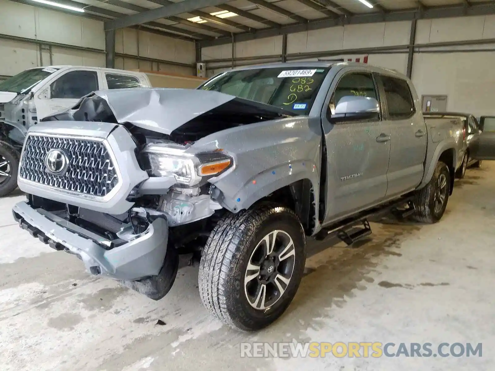 2 Photograph of a damaged car 5TFAZ5CN2KX083682 TOYOTA TACOMA 2019