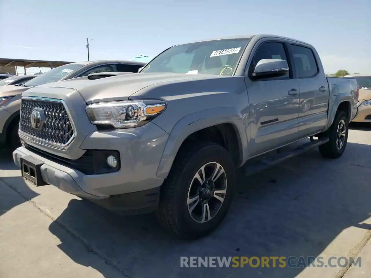 2 Photograph of a damaged car 5TFAZ5CN2KX084847 TOYOTA TACOMA 2019