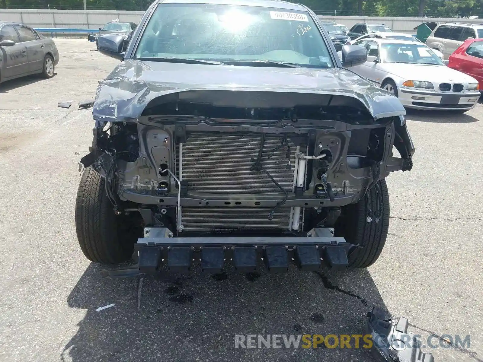 9 Photograph of a damaged car 5TFAZ5CN2KX085593 TOYOTA TACOMA 2019