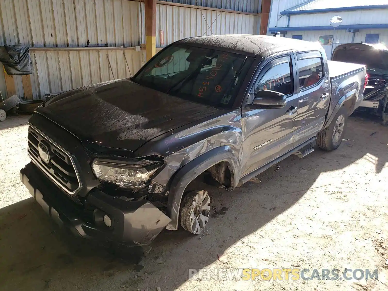 2 Photograph of a damaged car 5TFAZ5CN2KX086078 TOYOTA TACOMA 2019