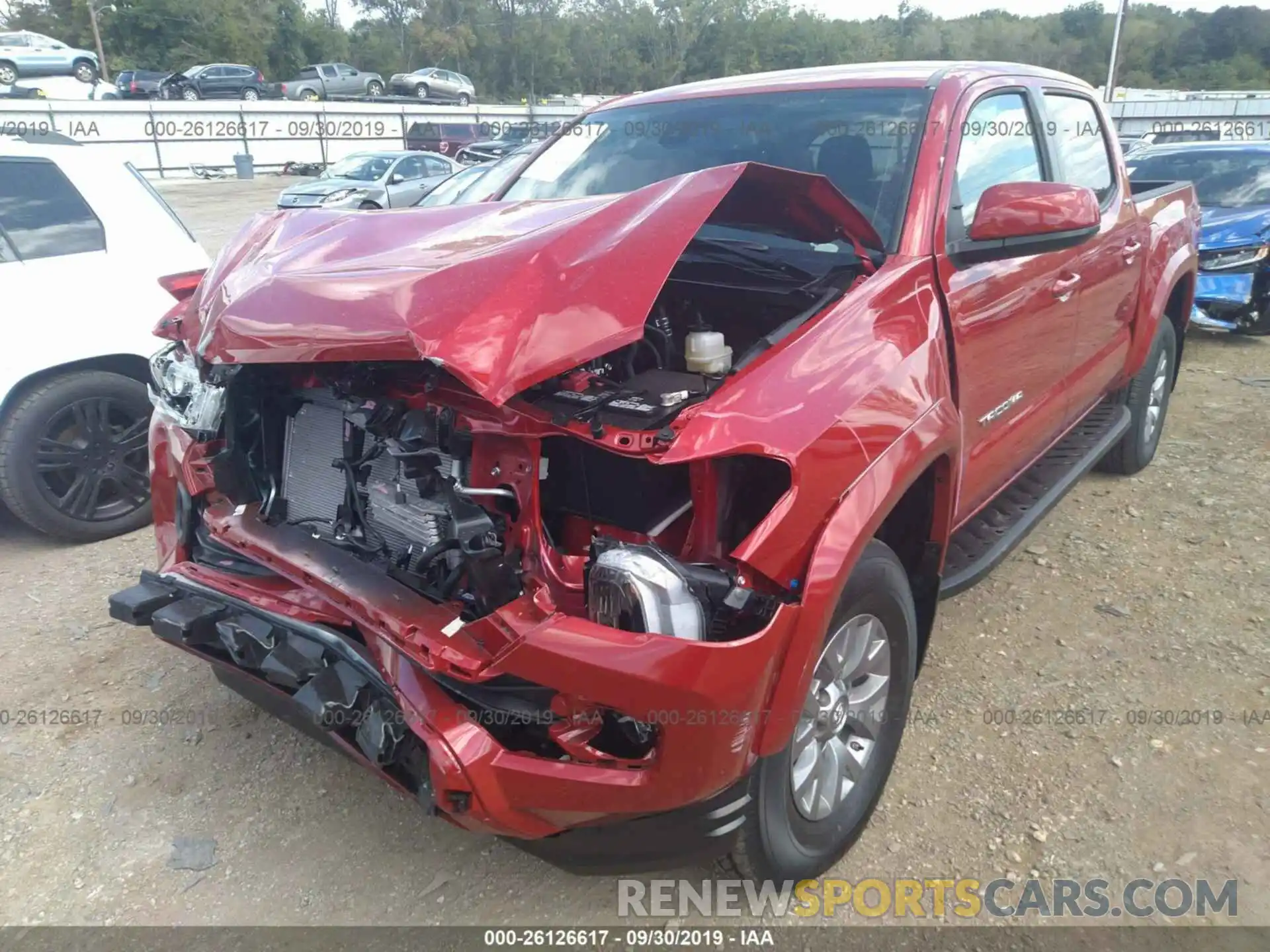 2 Photograph of a damaged car 5TFAZ5CN2KX086291 TOYOTA TACOMA 2019