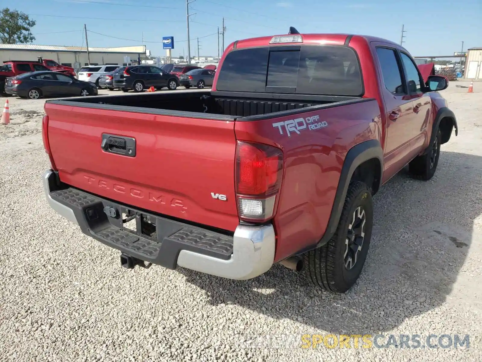 4 Photograph of a damaged car 5TFAZ5CN3KX074148 TOYOTA TACOMA 2019