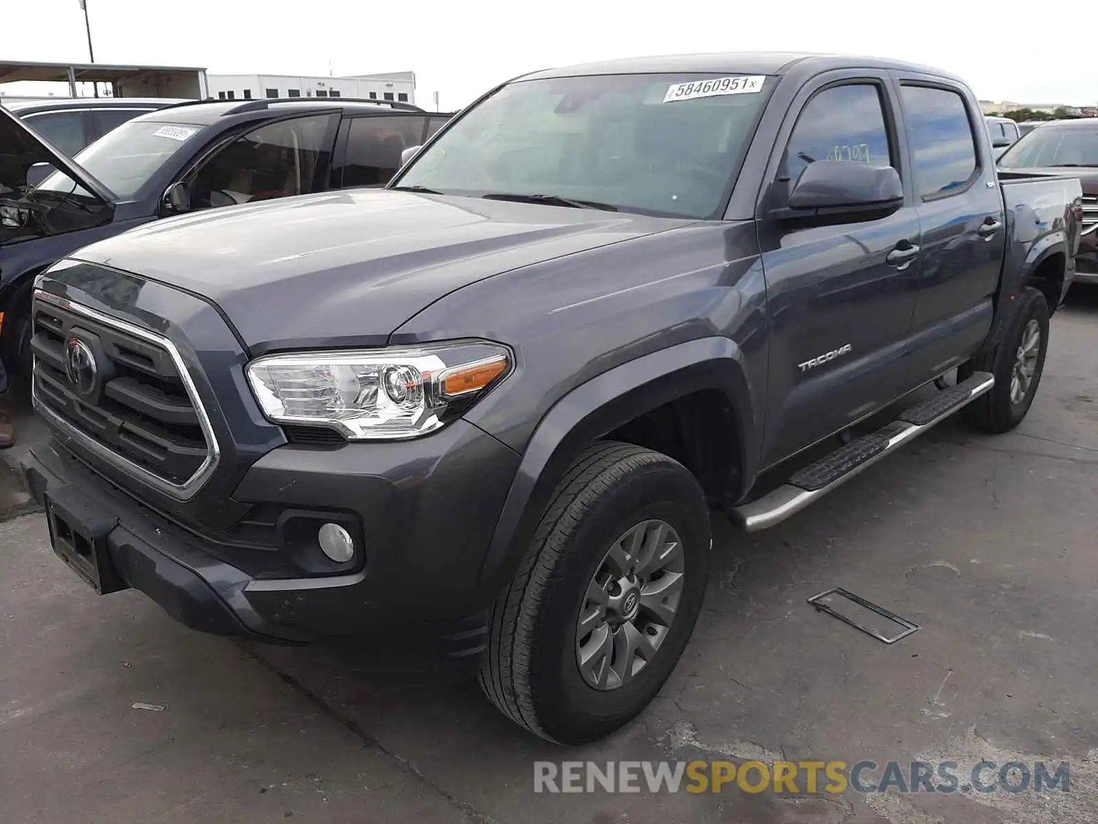 2 Photograph of a damaged car 5TFAZ5CN3KX084033 TOYOTA TACOMA 2019