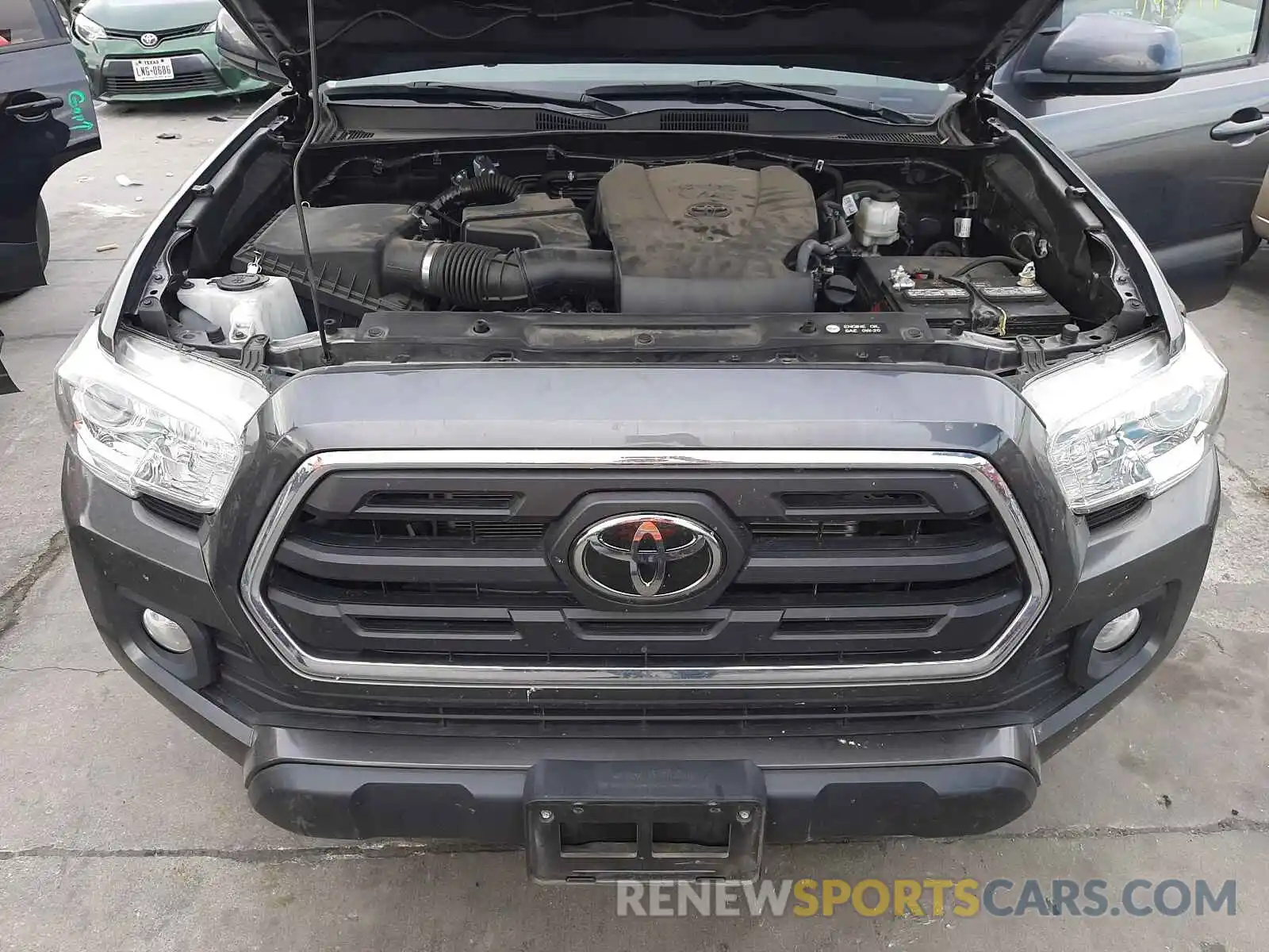 7 Photograph of a damaged car 5TFAZ5CN3KX084033 TOYOTA TACOMA 2019