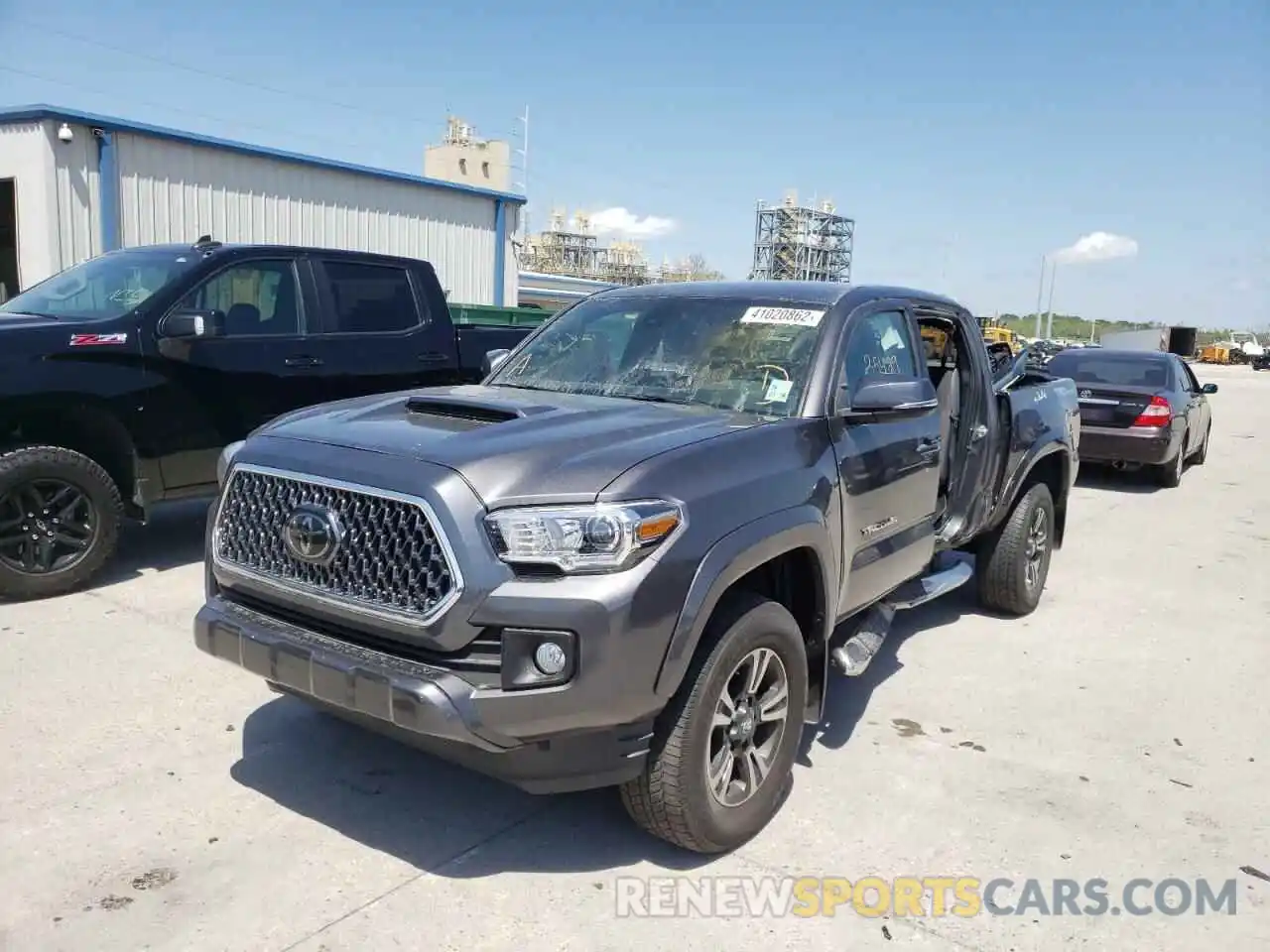 2 Photograph of a damaged car 5TFAZ5CN3KX086817 TOYOTA TACOMA 2019