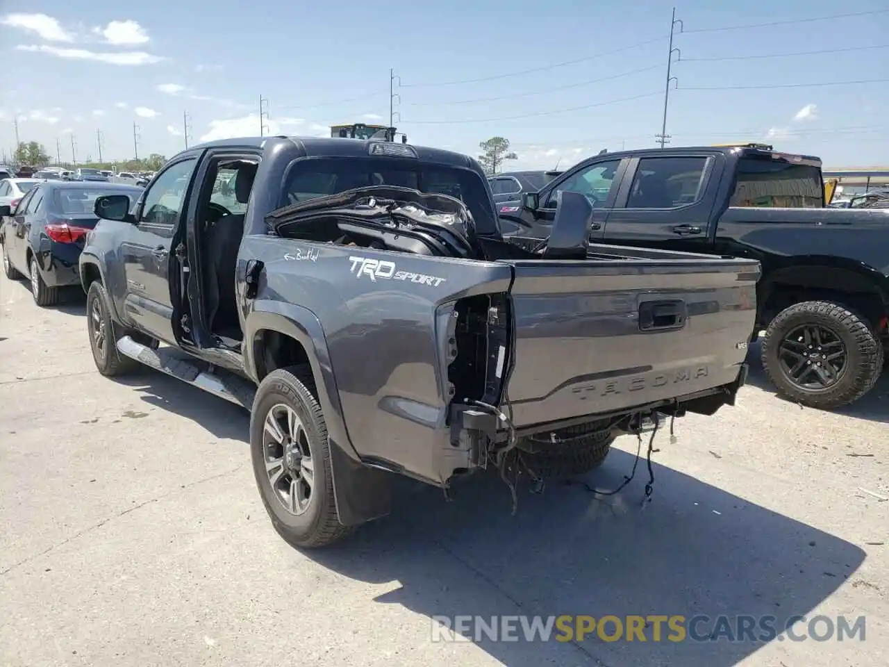 3 Photograph of a damaged car 5TFAZ5CN3KX086817 TOYOTA TACOMA 2019