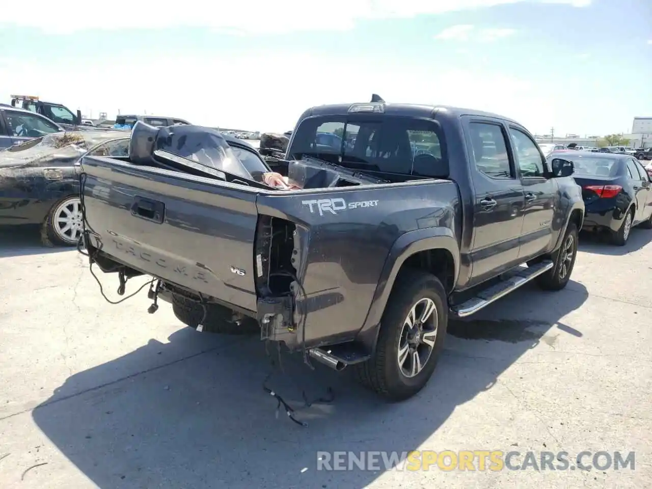 4 Photograph of a damaged car 5TFAZ5CN3KX086817 TOYOTA TACOMA 2019