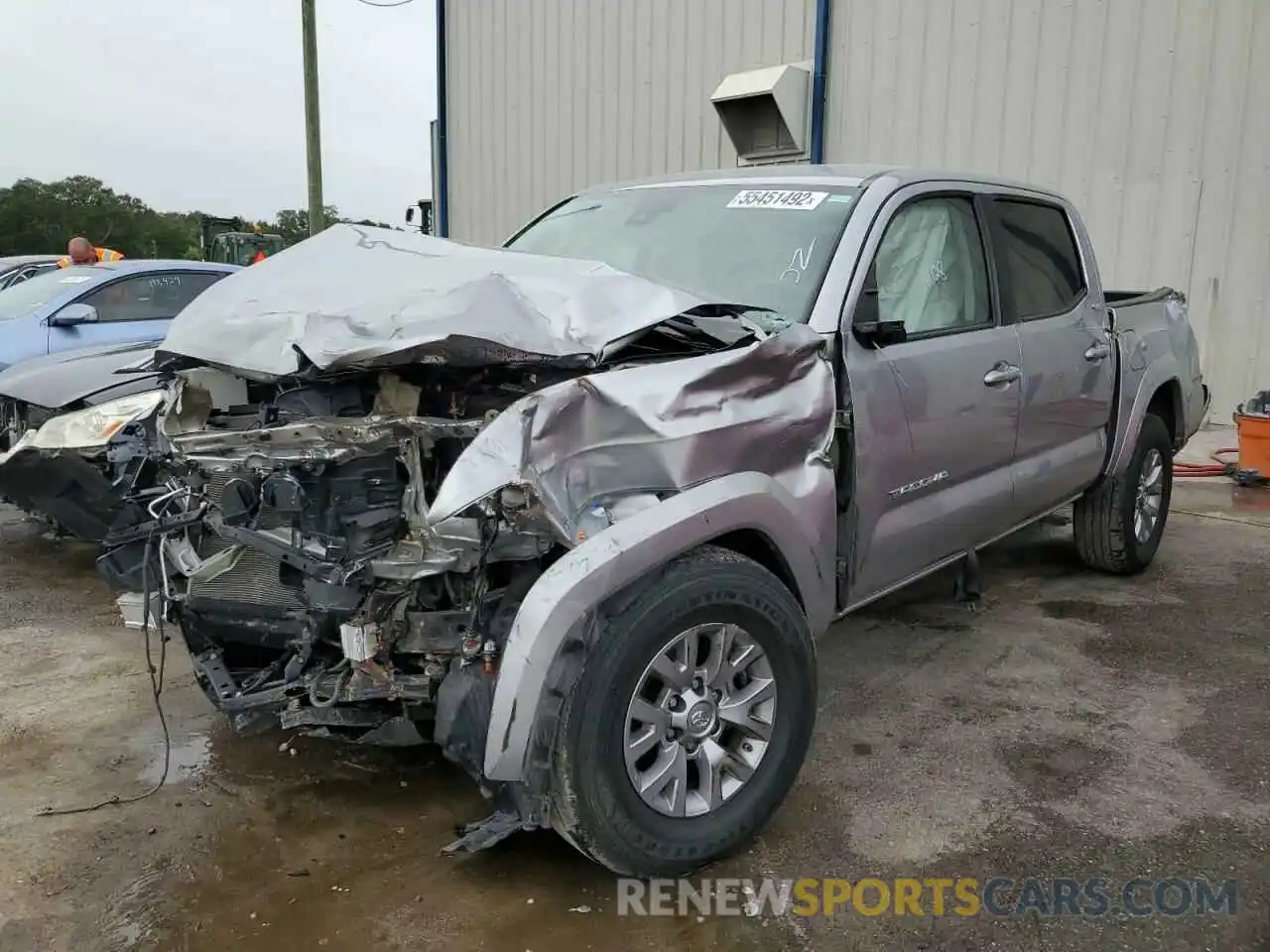 2 Photograph of a damaged car 5TFAZ5CN3KX087319 TOYOTA TACOMA 2019