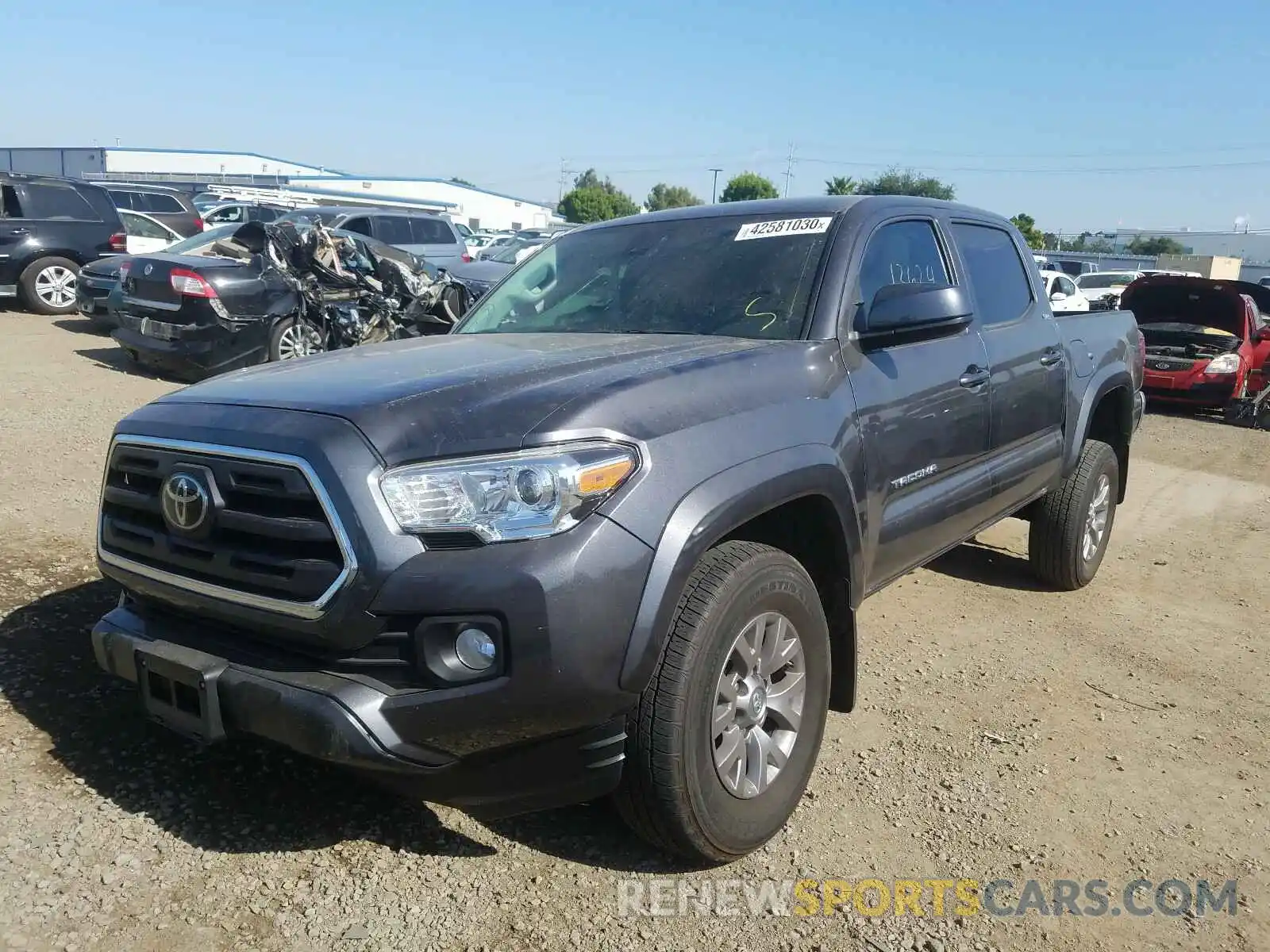 2 Photograph of a damaged car 5TFAZ5CN4KX073705 TOYOTA TACOMA 2019