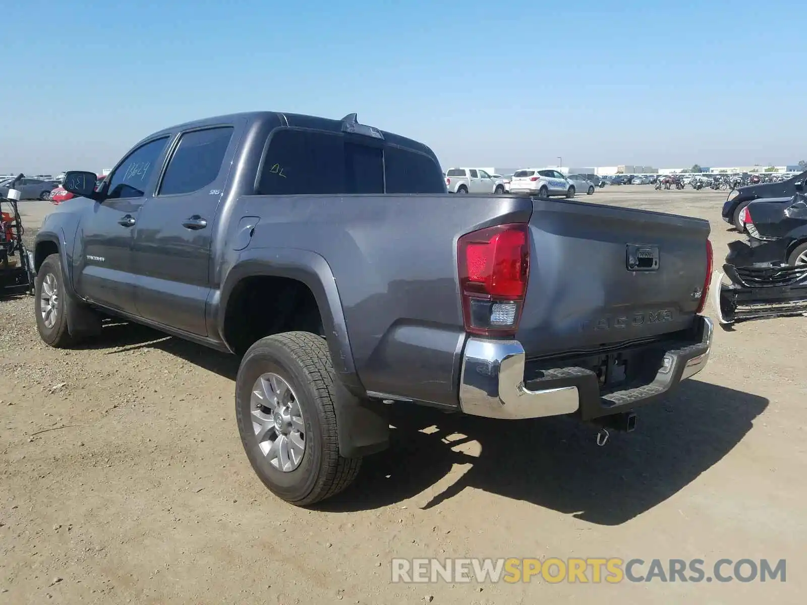 3 Photograph of a damaged car 5TFAZ5CN4KX073705 TOYOTA TACOMA 2019