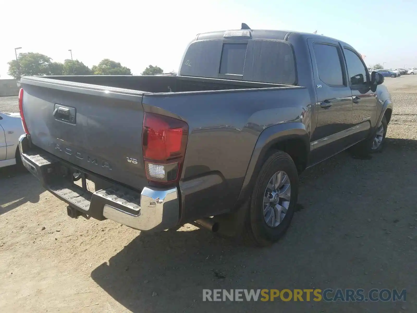 4 Photograph of a damaged car 5TFAZ5CN4KX073705 TOYOTA TACOMA 2019