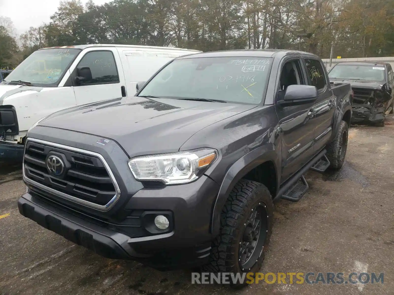 2 Photograph of a damaged car 5TFAZ5CN4KX074918 TOYOTA TACOMA 2019