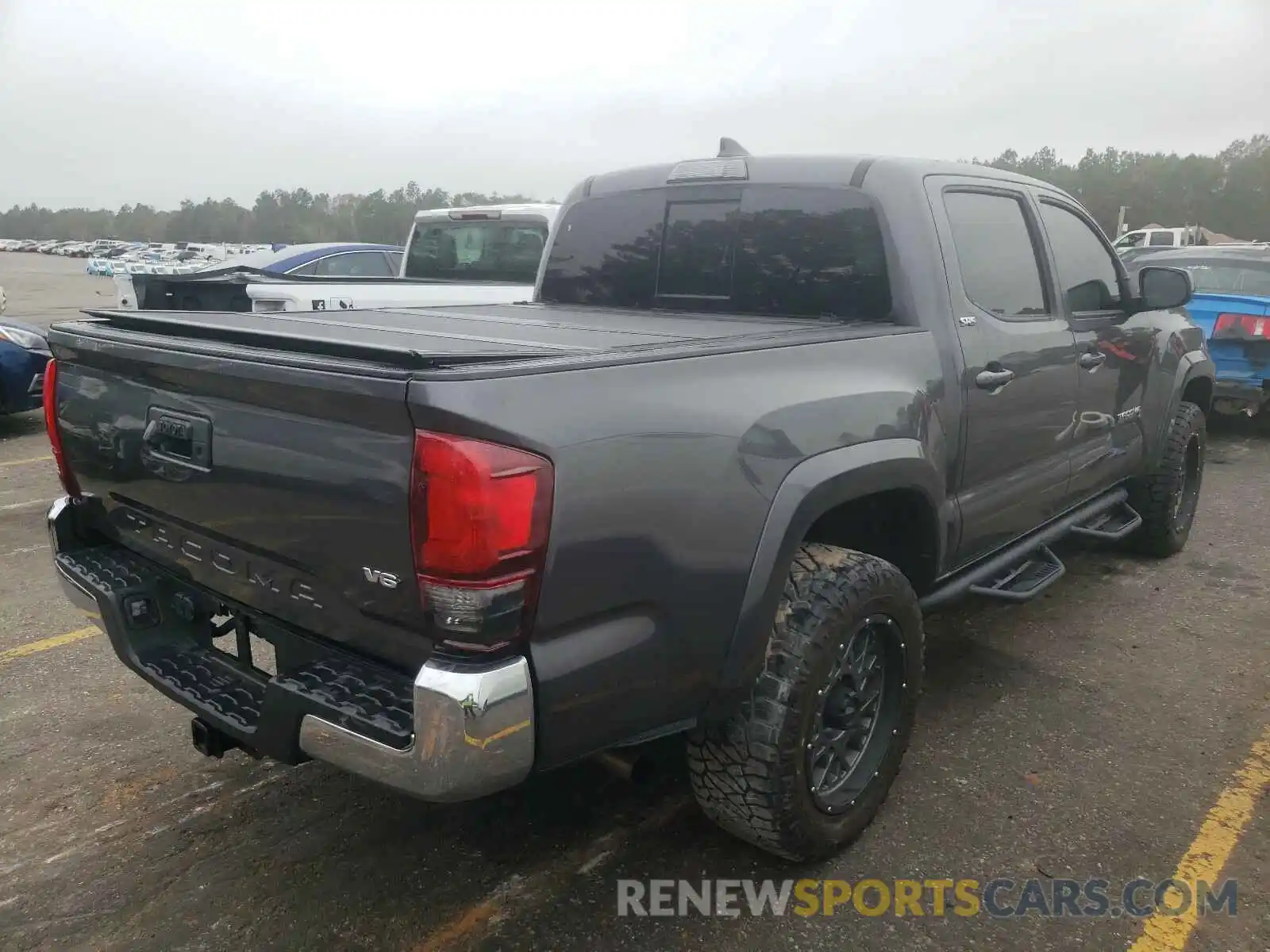 4 Photograph of a damaged car 5TFAZ5CN4KX074918 TOYOTA TACOMA 2019