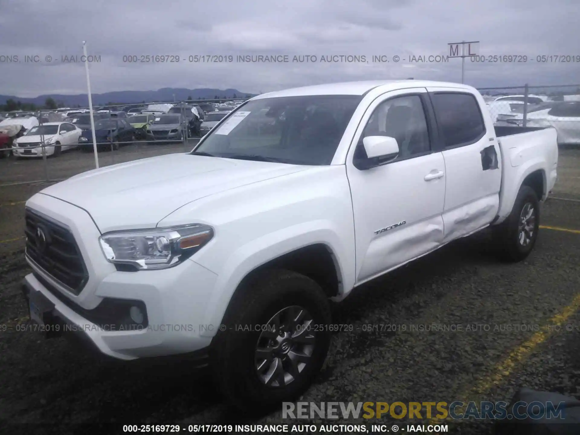 2 Photograph of a damaged car 5TFAZ5CN4KX077432 TOYOTA TACOMA 2019