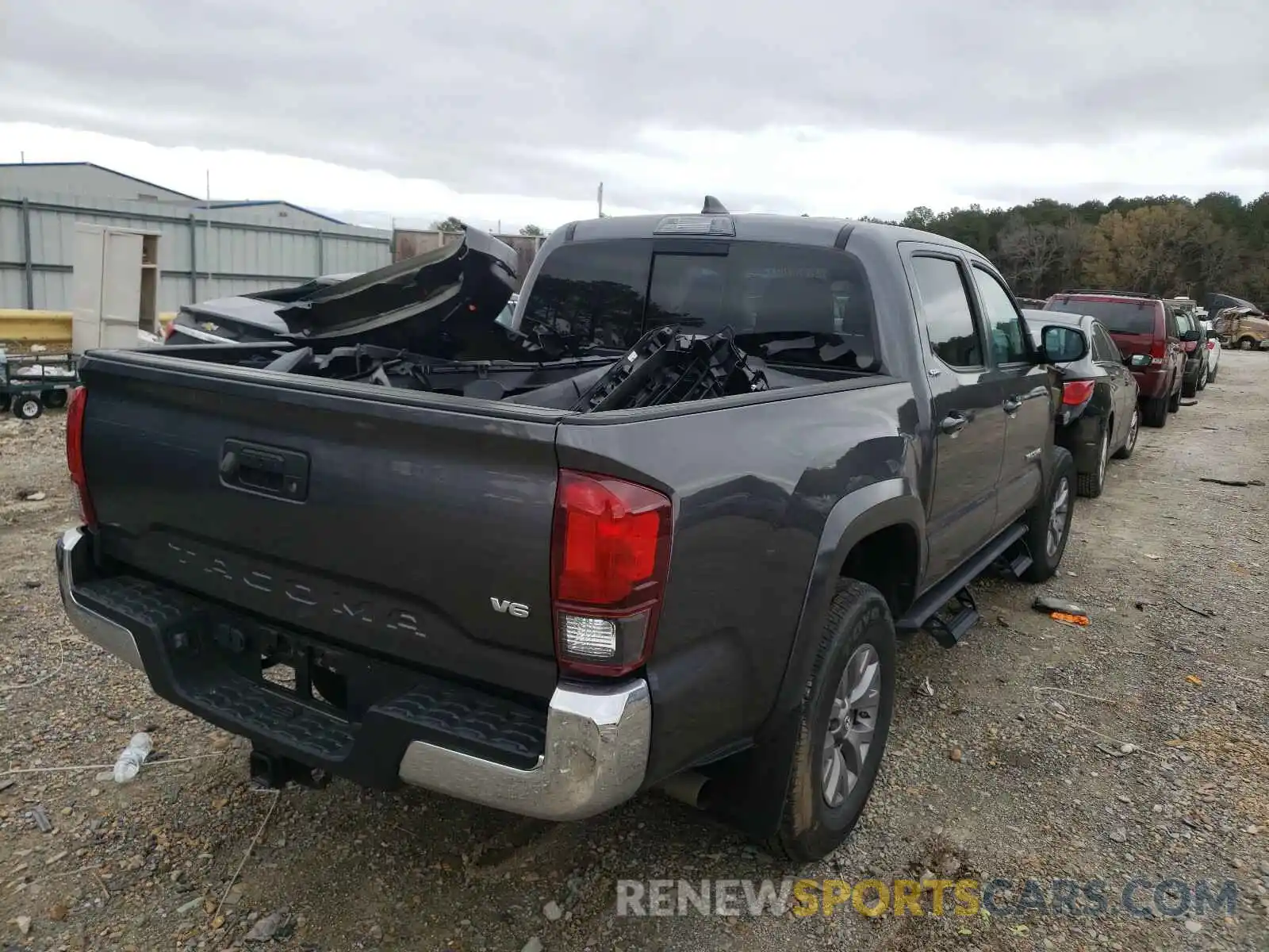 4 Photograph of a damaged car 5TFAZ5CN4KX077687 TOYOTA TACOMA 2019