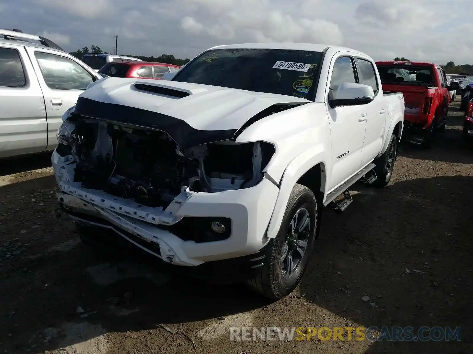 2 Photograph of a damaged car 5TFAZ5CN4KX084123 TOYOTA TACOMA 2019