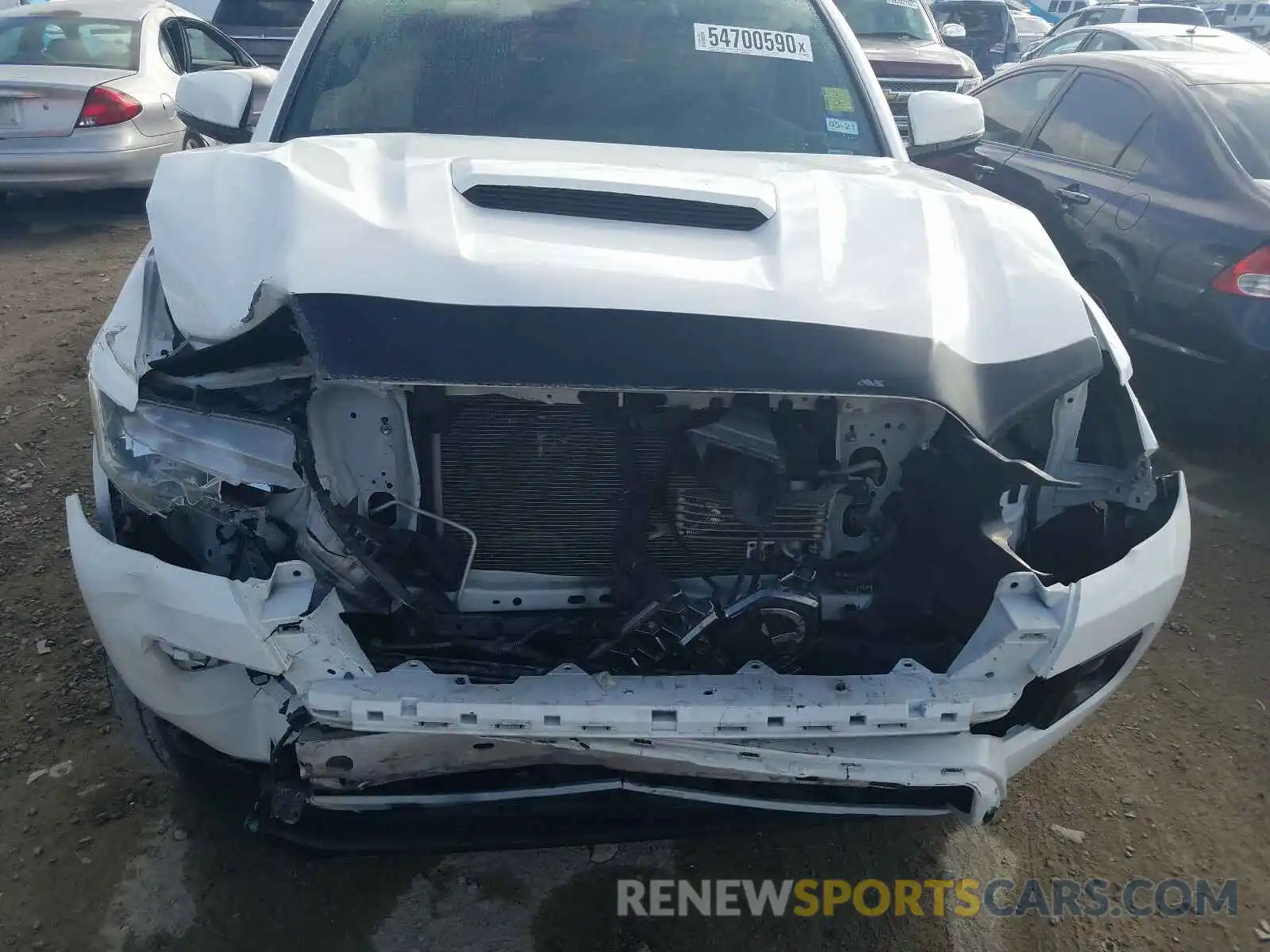 7 Photograph of a damaged car 5TFAZ5CN4KX084123 TOYOTA TACOMA 2019