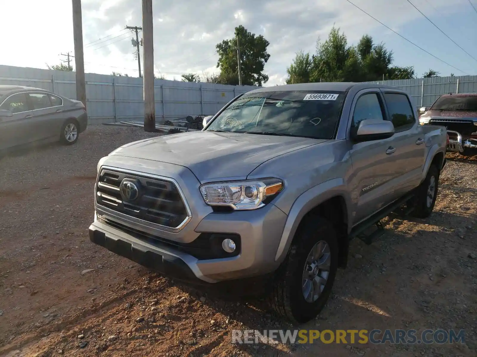 2 Photograph of a damaged car 5TFAZ5CN4KX086924 TOYOTA TACOMA 2019