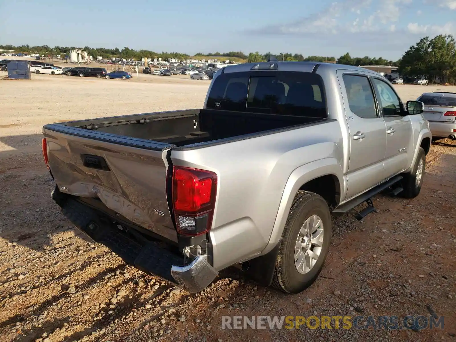 4 Photograph of a damaged car 5TFAZ5CN4KX086924 TOYOTA TACOMA 2019