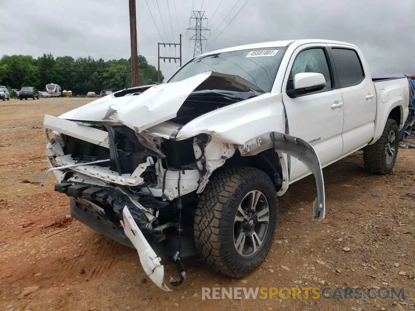 2 Photograph of a damaged car 5TFAZ5CN5KX073132 TOYOTA TACOMA 2019