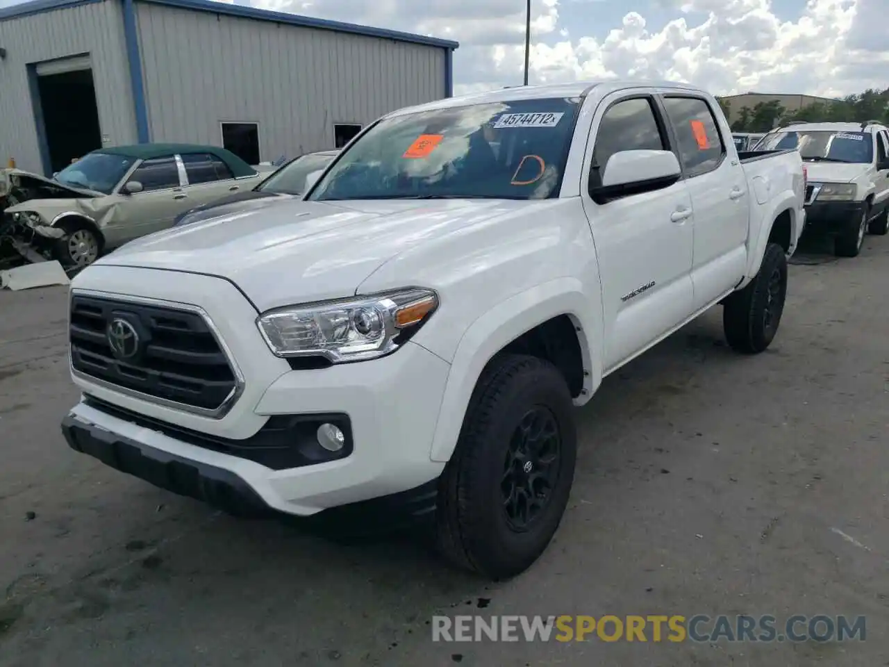 2 Photograph of a damaged car 5TFAZ5CN5KX074815 TOYOTA TACOMA 2019