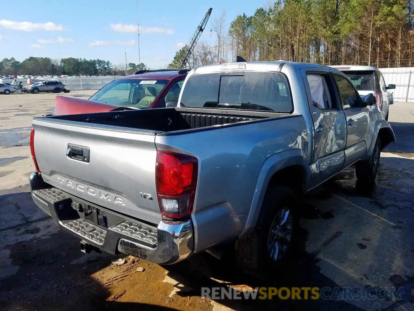 4 Photograph of a damaged car 5TFAZ5CN5KX076077 TOYOTA TACOMA 2019