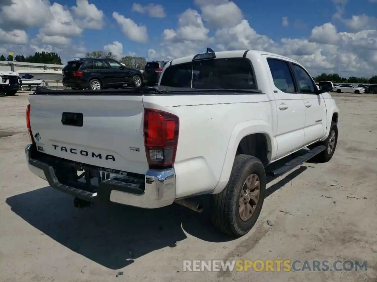 4 Photograph of a damaged car 5TFAZ5CN5KX076578 TOYOTA TACOMA 2019