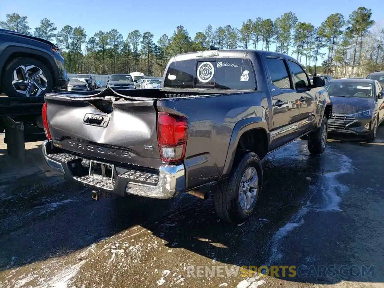 4 Photograph of a damaged car 5TFAZ5CN5KX076869 TOYOTA TACOMA 2019