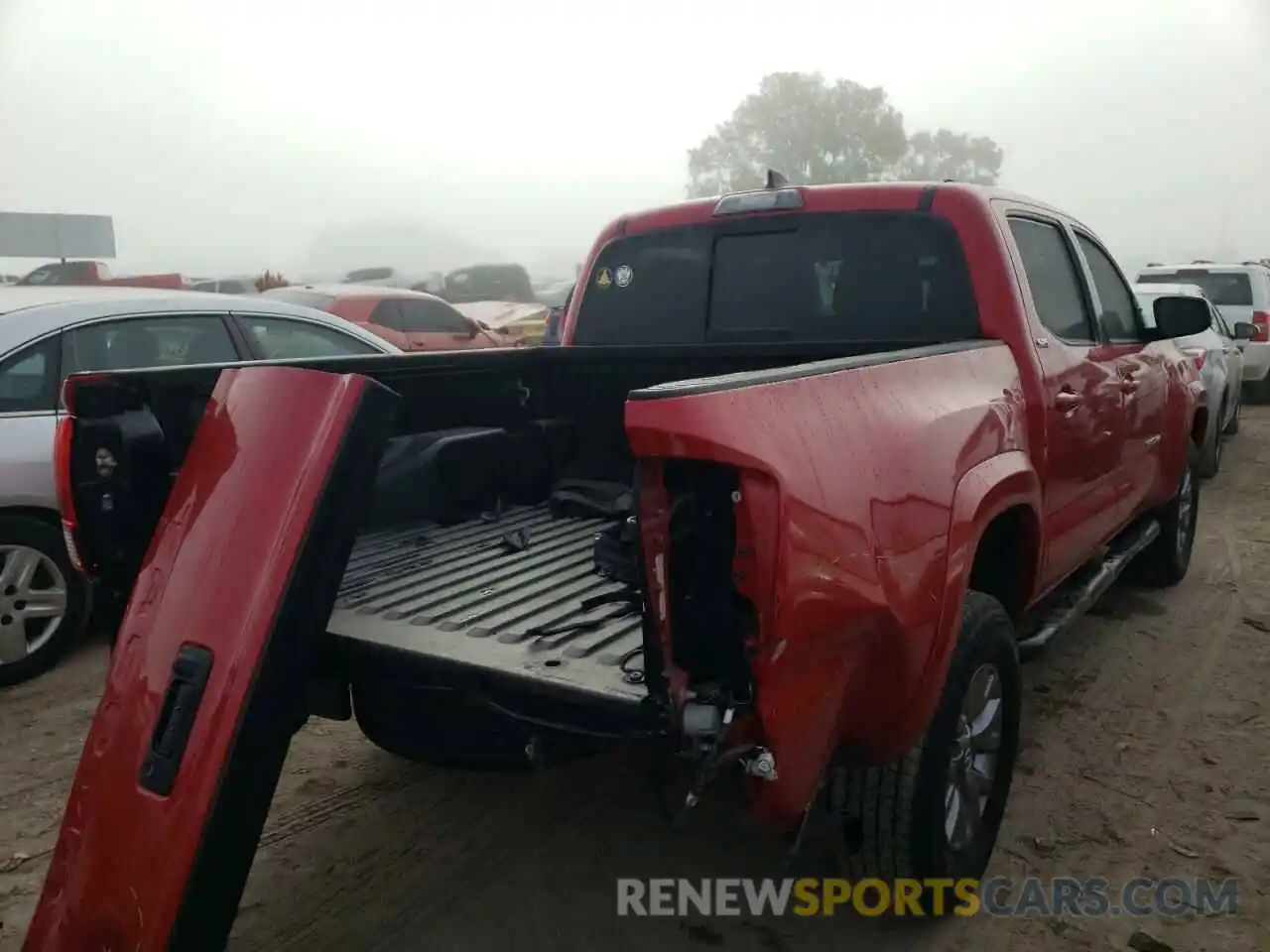 4 Photograph of a damaged car 5TFAZ5CN5KX077455 TOYOTA TACOMA 2019