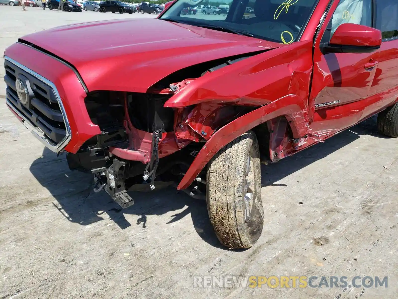 9 Photograph of a damaged car 5TFAZ5CN5KX077570 TOYOTA TACOMA 2019