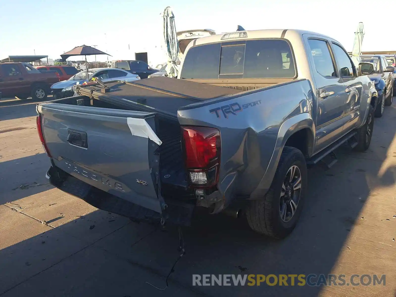 4 Photograph of a damaged car 5TFAZ5CN5KX078542 TOYOTA TACOMA 2019