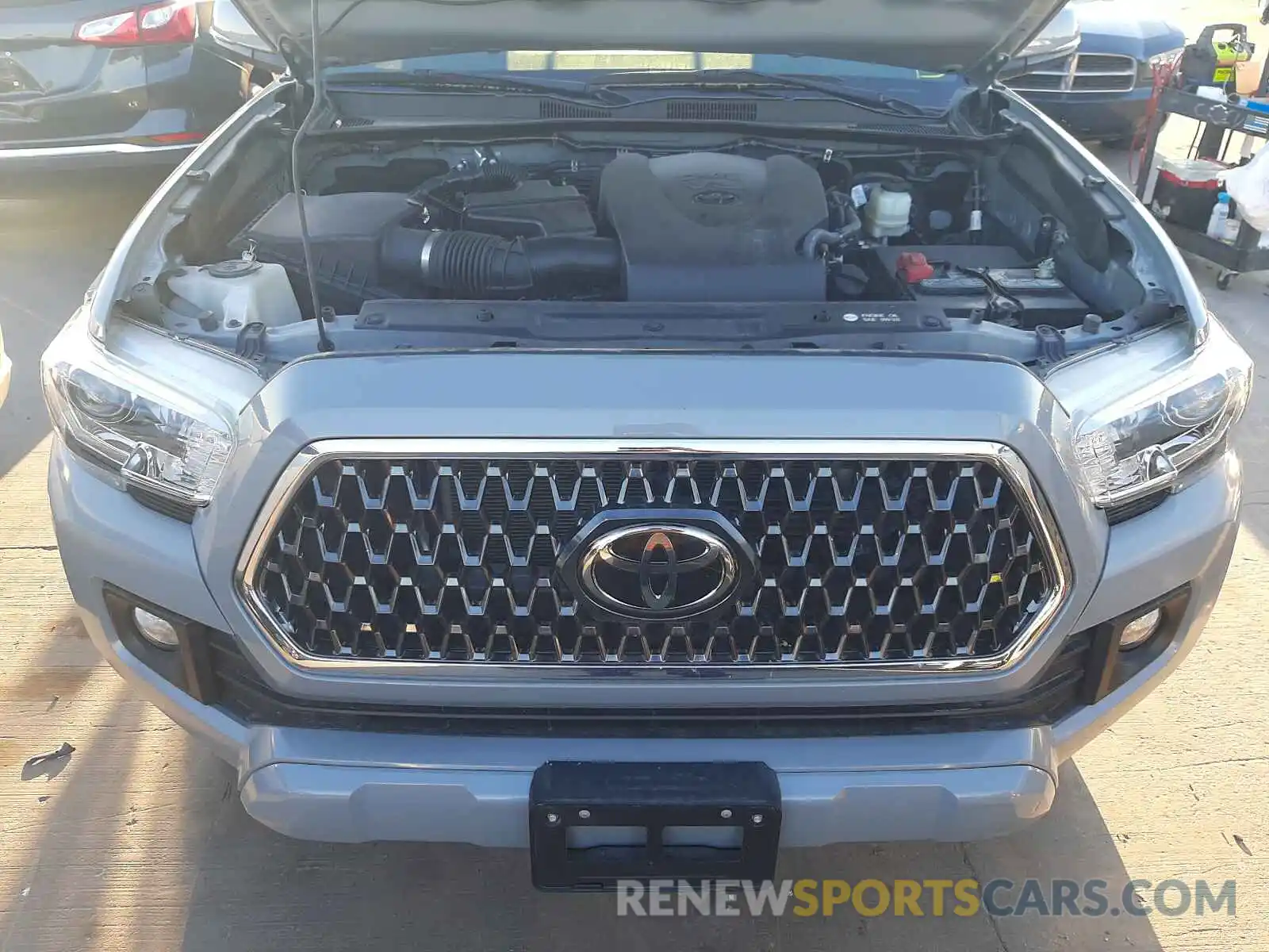 7 Photograph of a damaged car 5TFAZ5CN5KX078542 TOYOTA TACOMA 2019