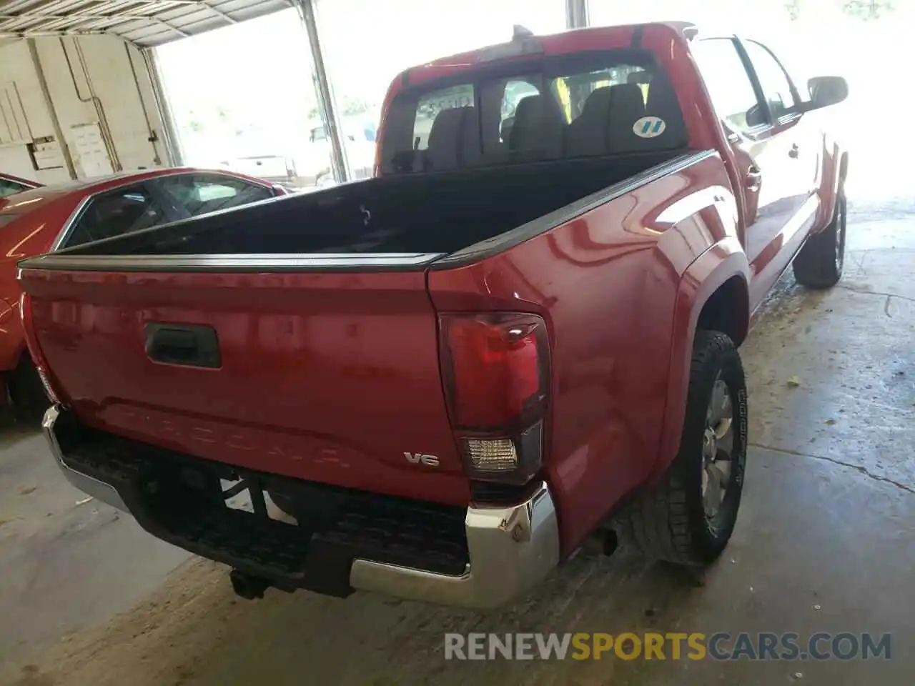 4 Photograph of a damaged car 5TFAZ5CN5KX078606 TOYOTA TACOMA 2019