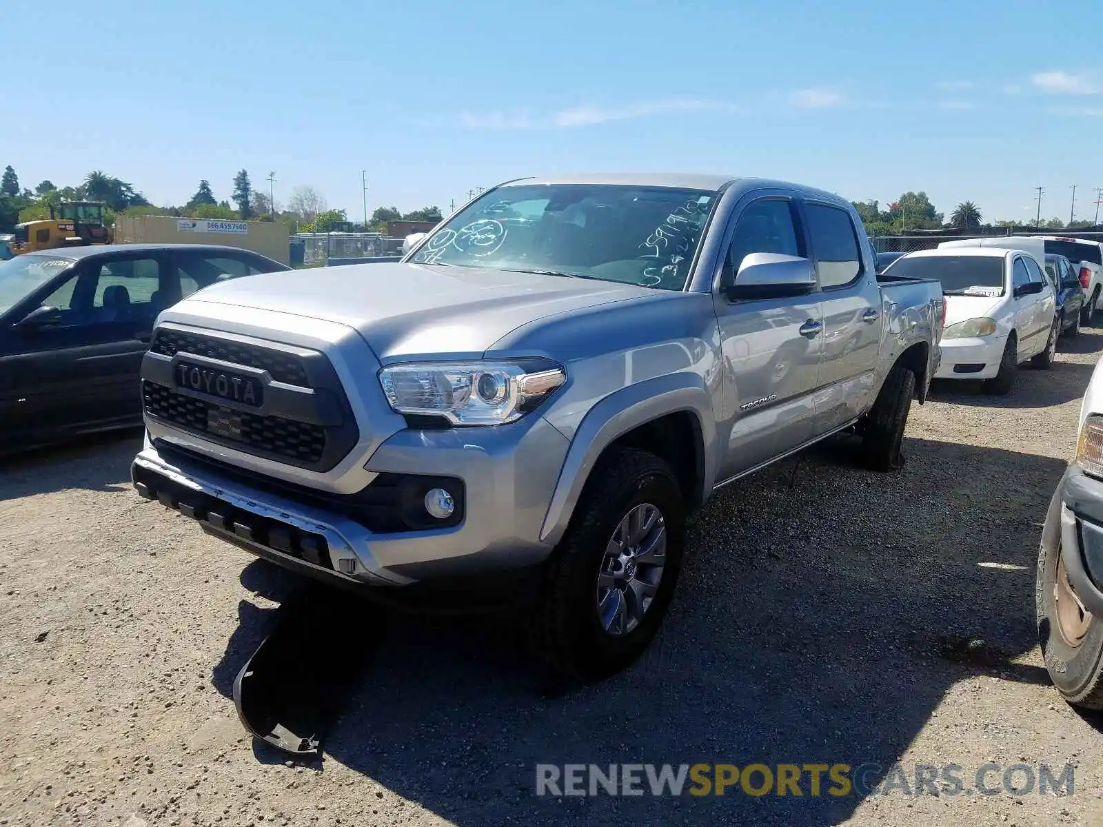 2 Photograph of a damaged car 5TFAZ5CN5KX085720 TOYOTA TACOMA 2019