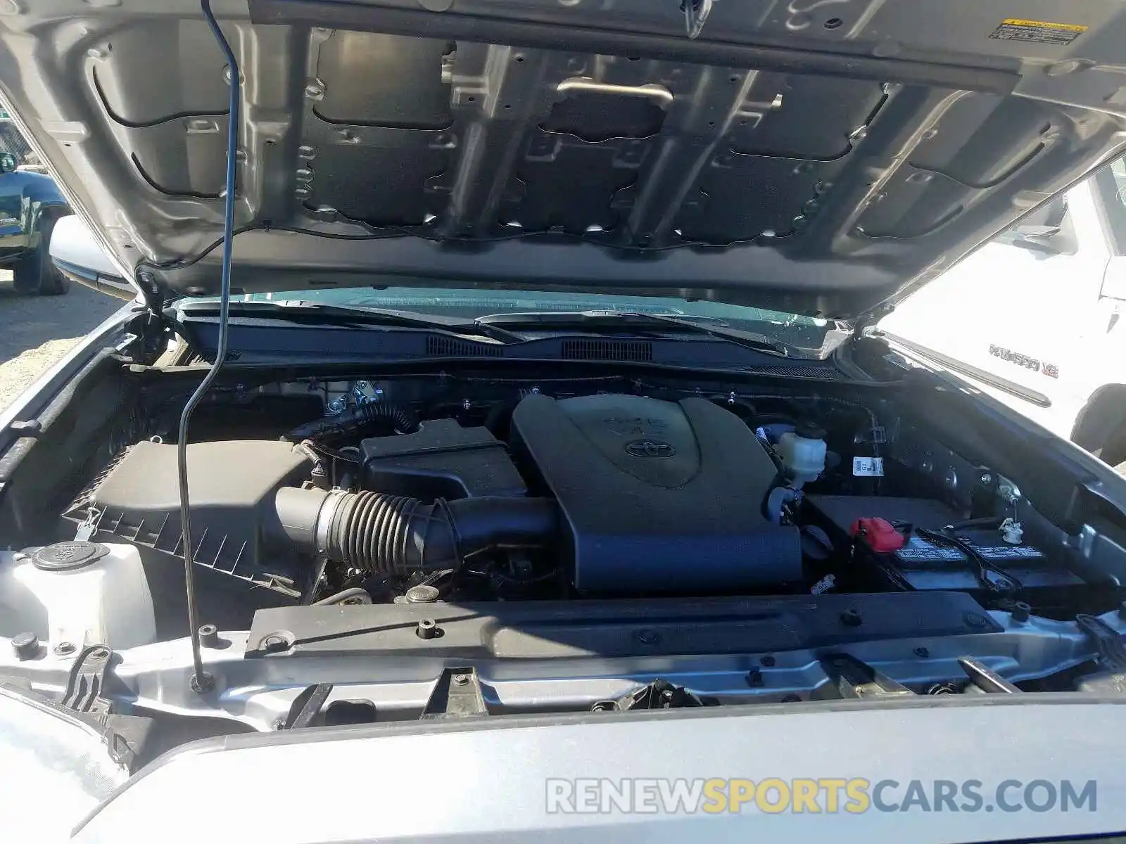 7 Photograph of a damaged car 5TFAZ5CN5KX085720 TOYOTA TACOMA 2019