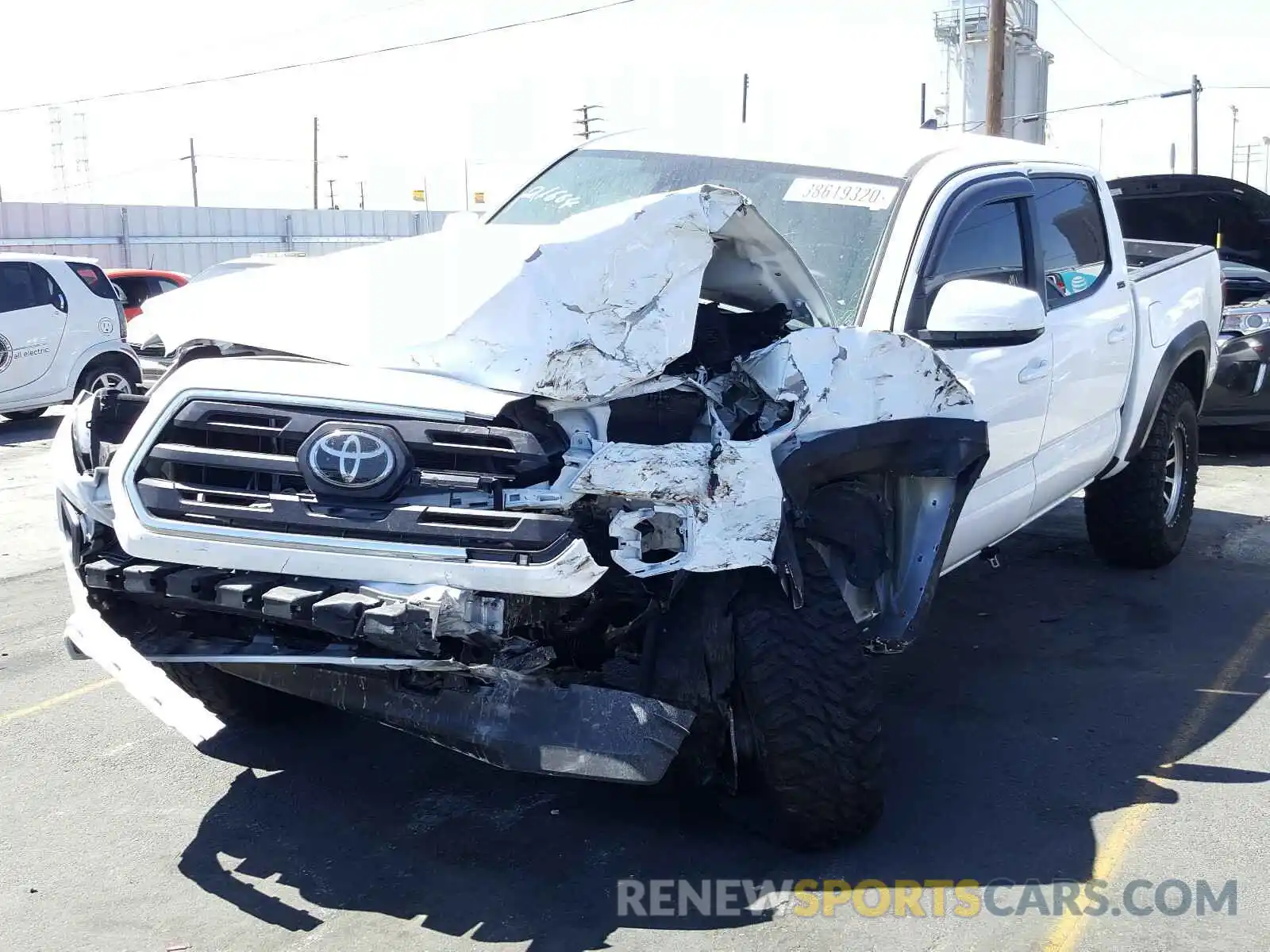 2 Photograph of a damaged car 5TFAZ5CN5KX086446 TOYOTA TACOMA 2019