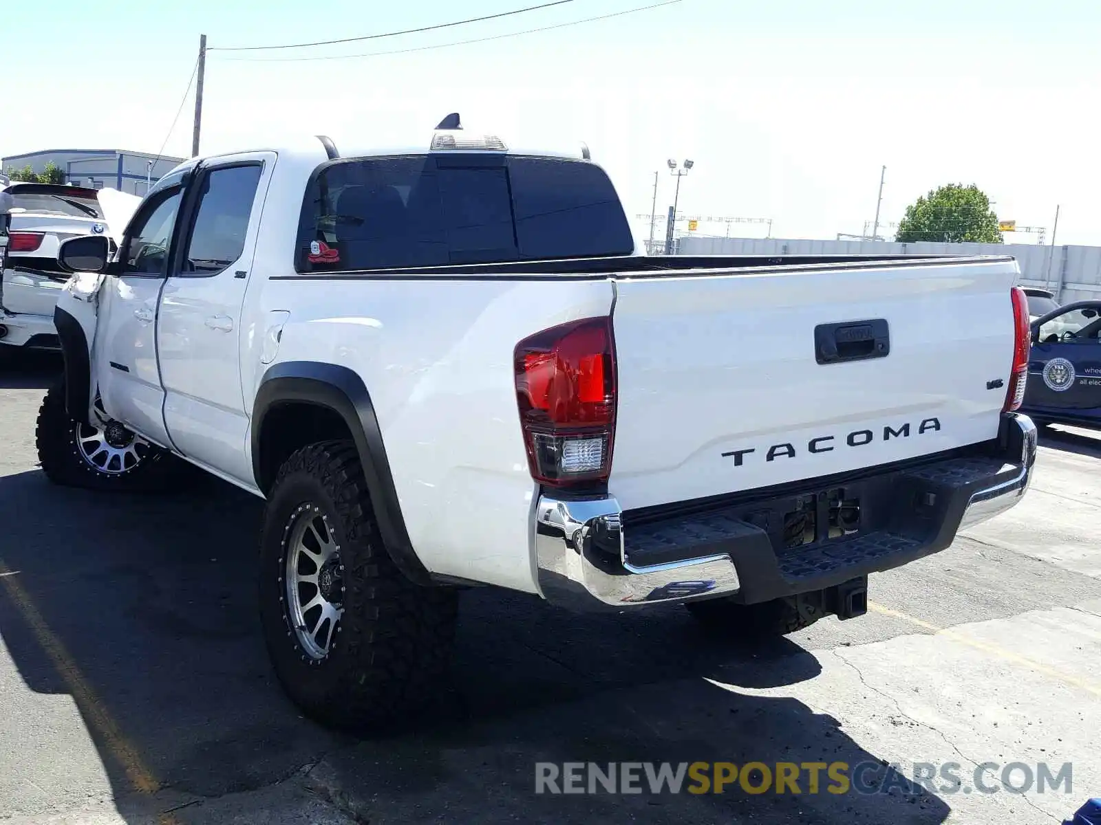 3 Photograph of a damaged car 5TFAZ5CN5KX086446 TOYOTA TACOMA 2019