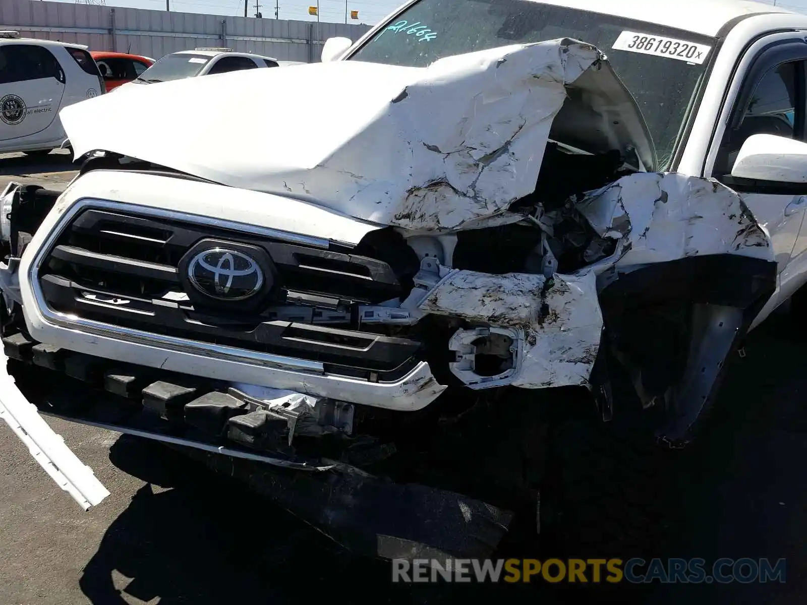 9 Photograph of a damaged car 5TFAZ5CN5KX086446 TOYOTA TACOMA 2019