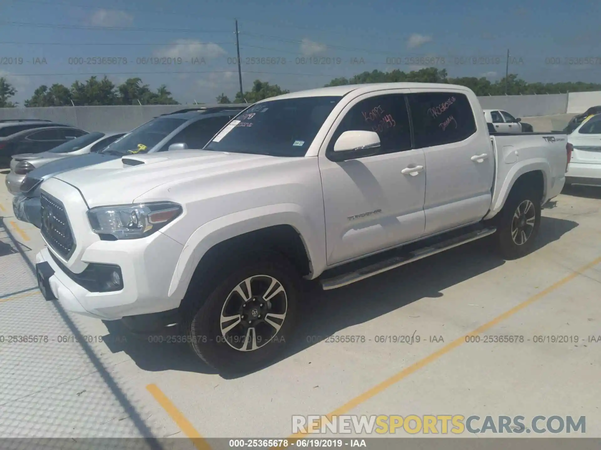 2 Photograph of a damaged car 5TFAZ5CN6KX072457 TOYOTA TACOMA 2019